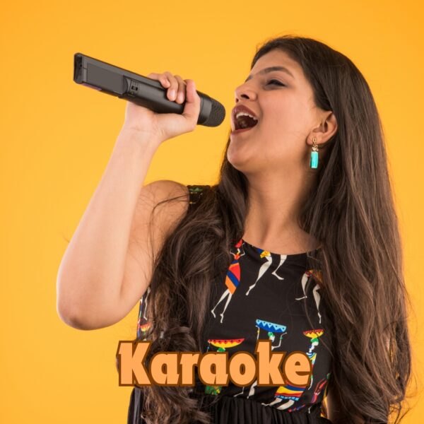 women singing on karaoke mic